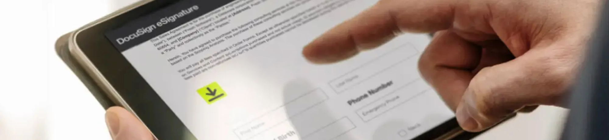 finger touching ipad screen